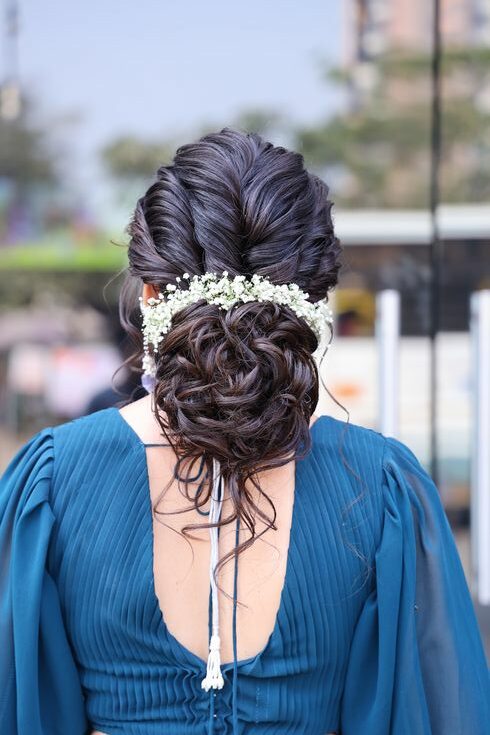 Waterfall French braid low bun