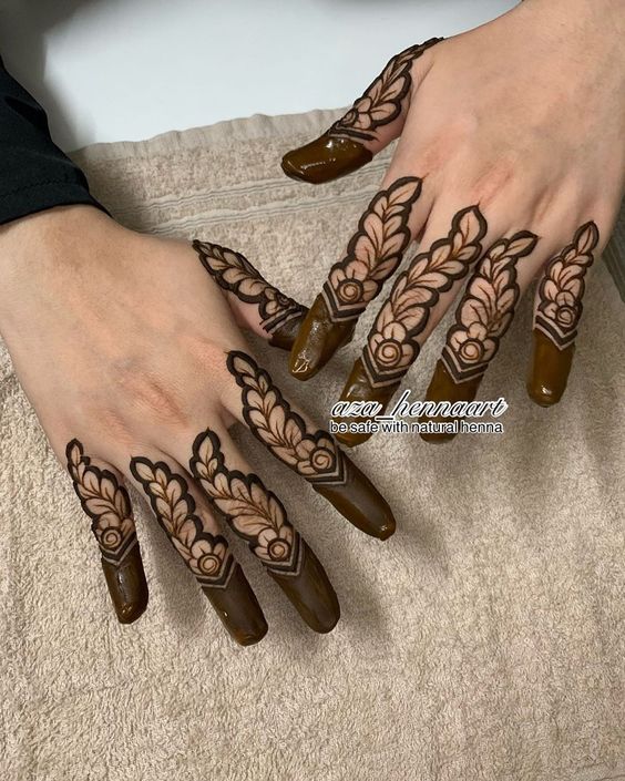 finger mehendi design with leaves