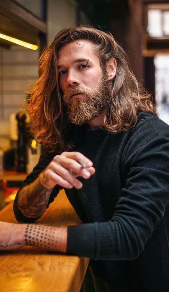 full side swept long hairstyle for men