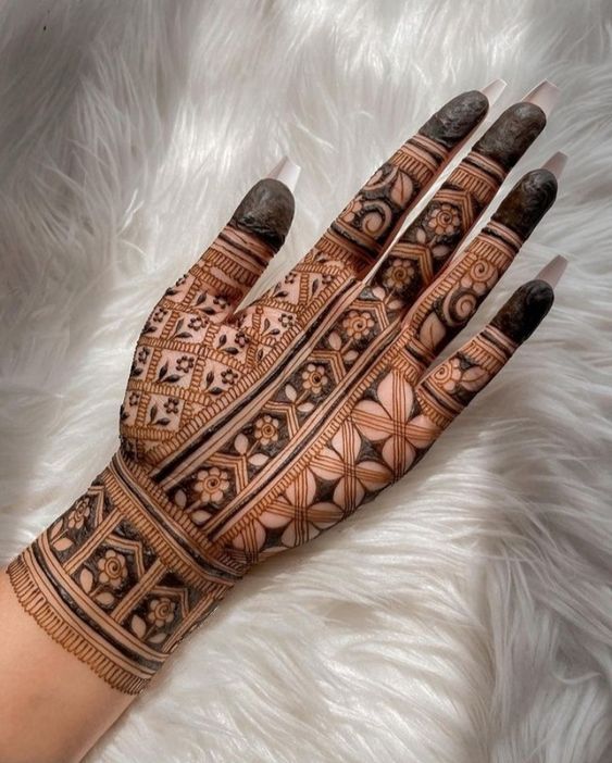 unique mehndi designs front hand with multiple motifs