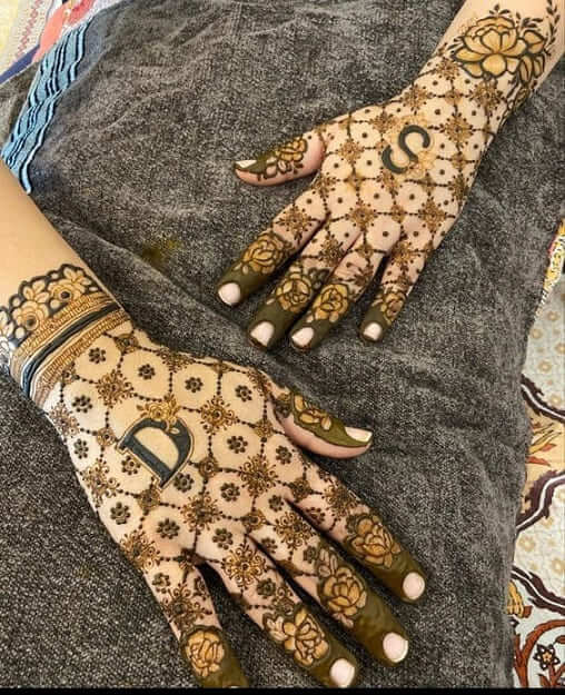 Engagement mehndi designs with name initials