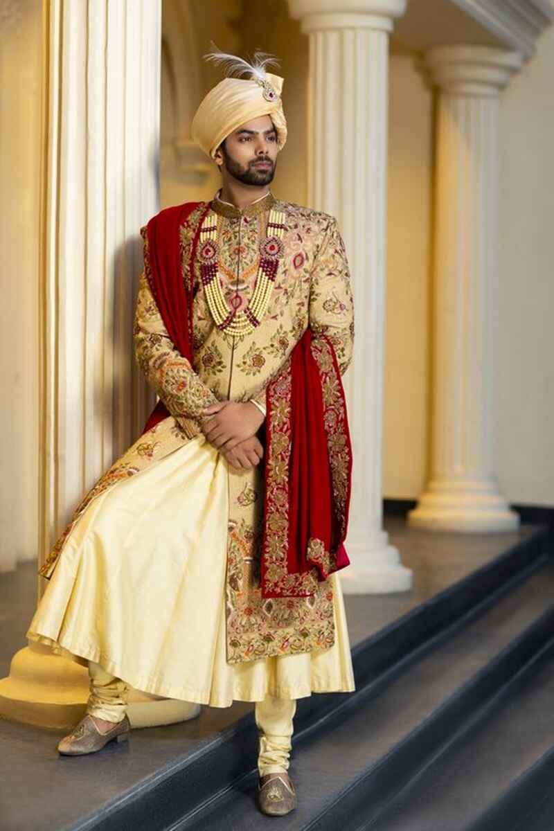 Golden-sherwani-with-red-dupatta-royal-sherwani-for-groom