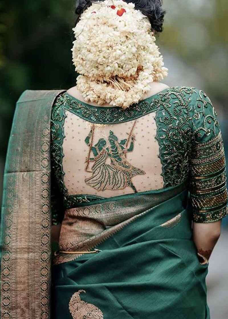 Radha-Krishna-motifs-marriage-bridal-maggam-work-blouse-designs