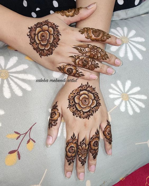 Rose mehndi design for back hand