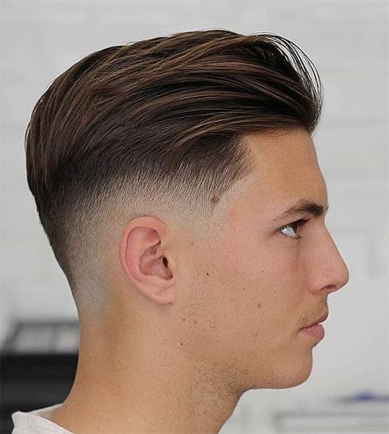 Slicked back short haircuts for men with undercut fade