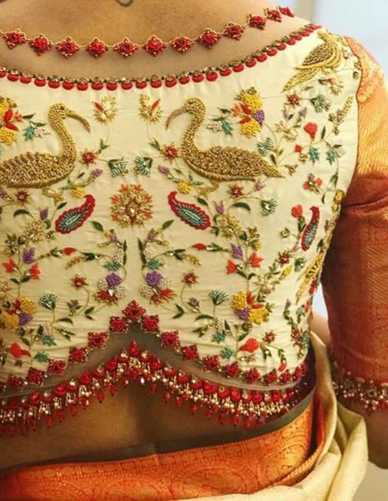 Swan-and-floral-motifs-marriage-bridal-maggam-work-blouse-designs