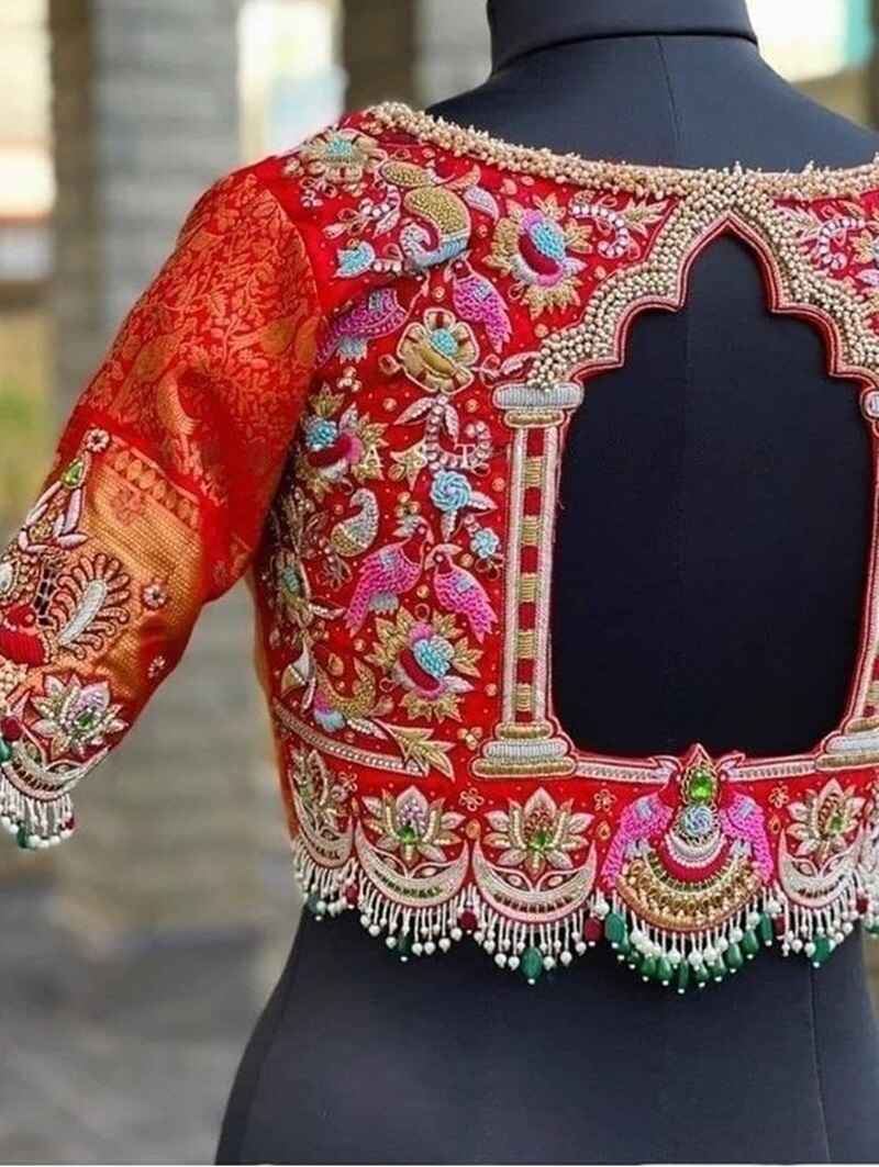 Temple-cut-out-marriage-bridal-maggam-work-blouse-designs