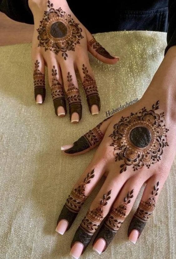 Tikki henna design for back hand