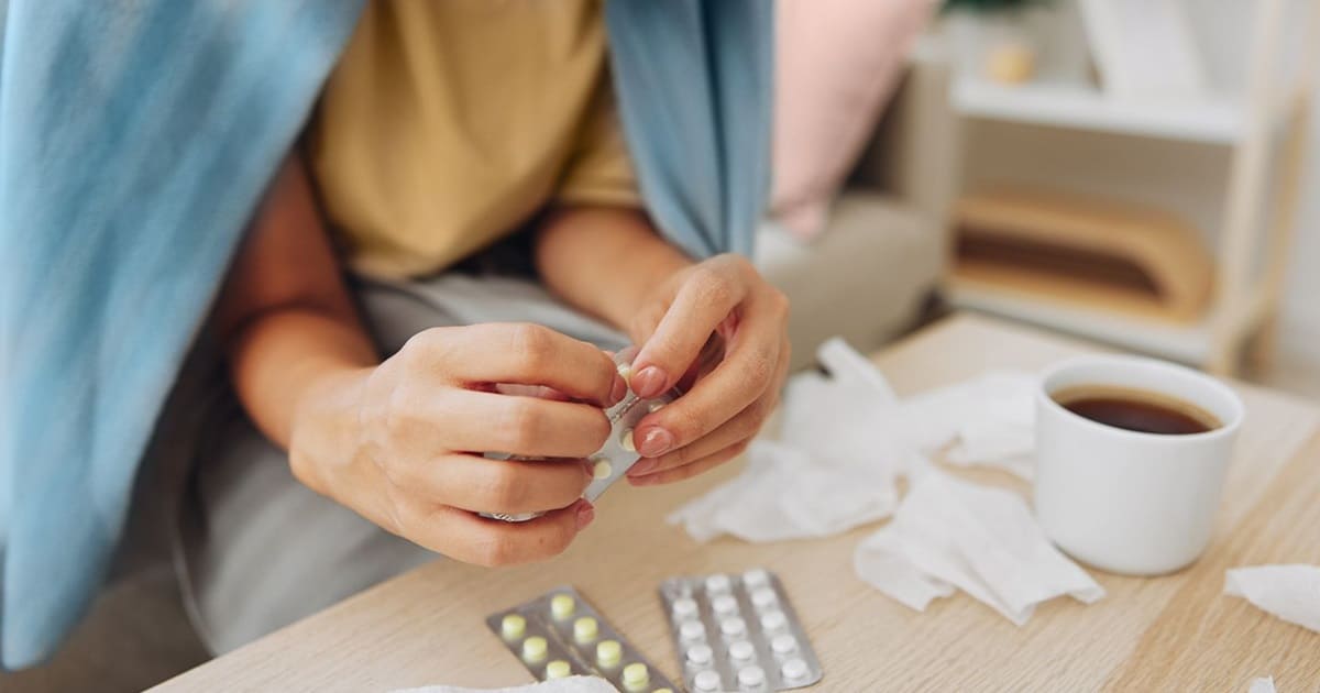 man taking medicine