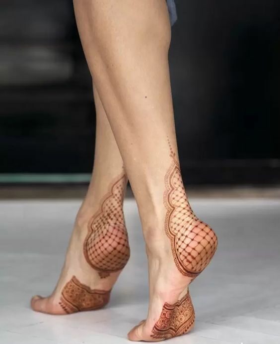 Intricate back of the feet mehndi design