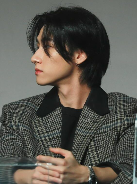 Medium-length hair with curtain bangs