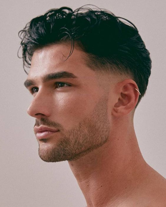 Medium length hair with low fade