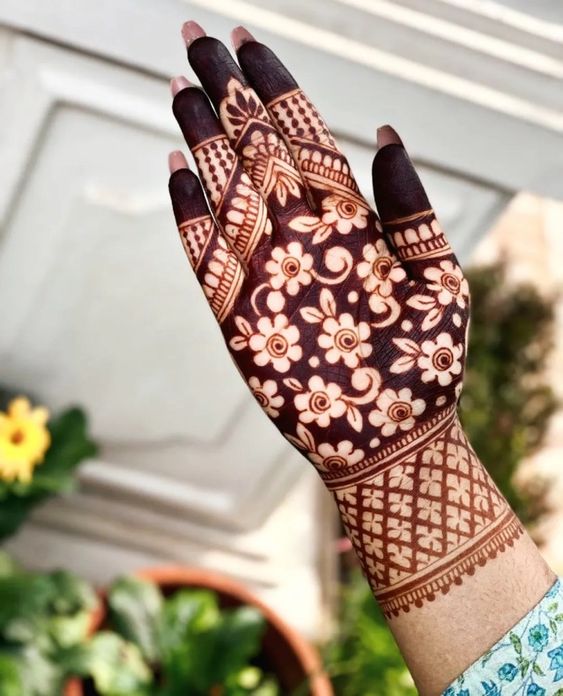 Negative flower mehndi design front hand