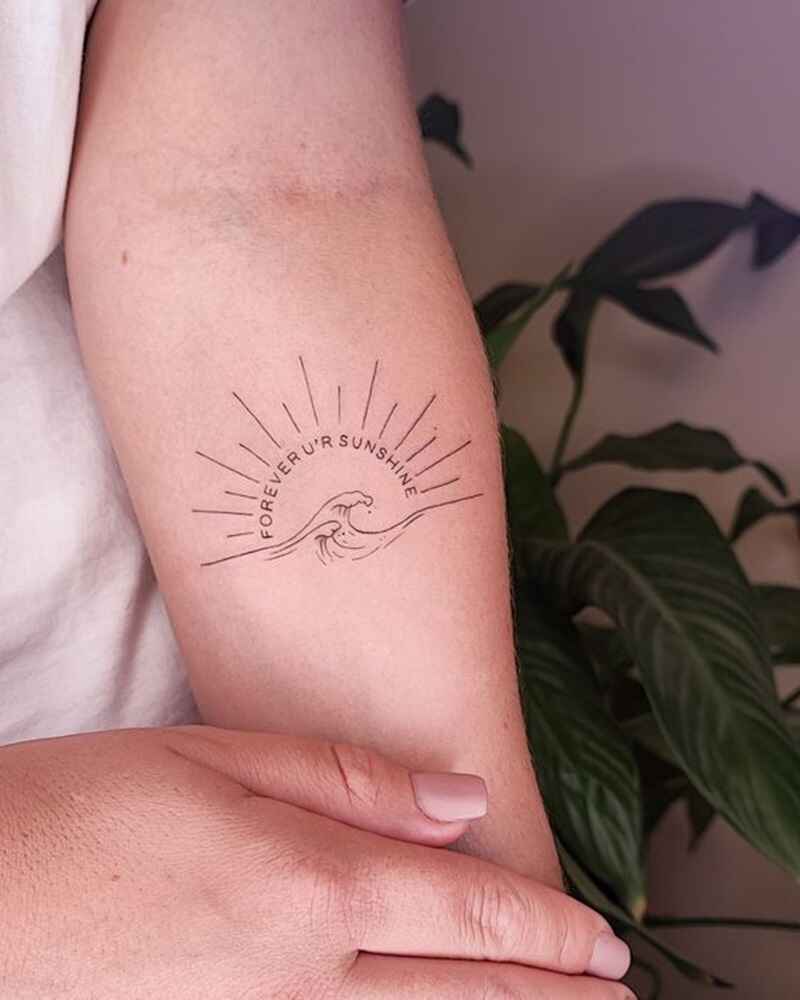 Rising-sun-with-quote-simple-tattoos-for-girls