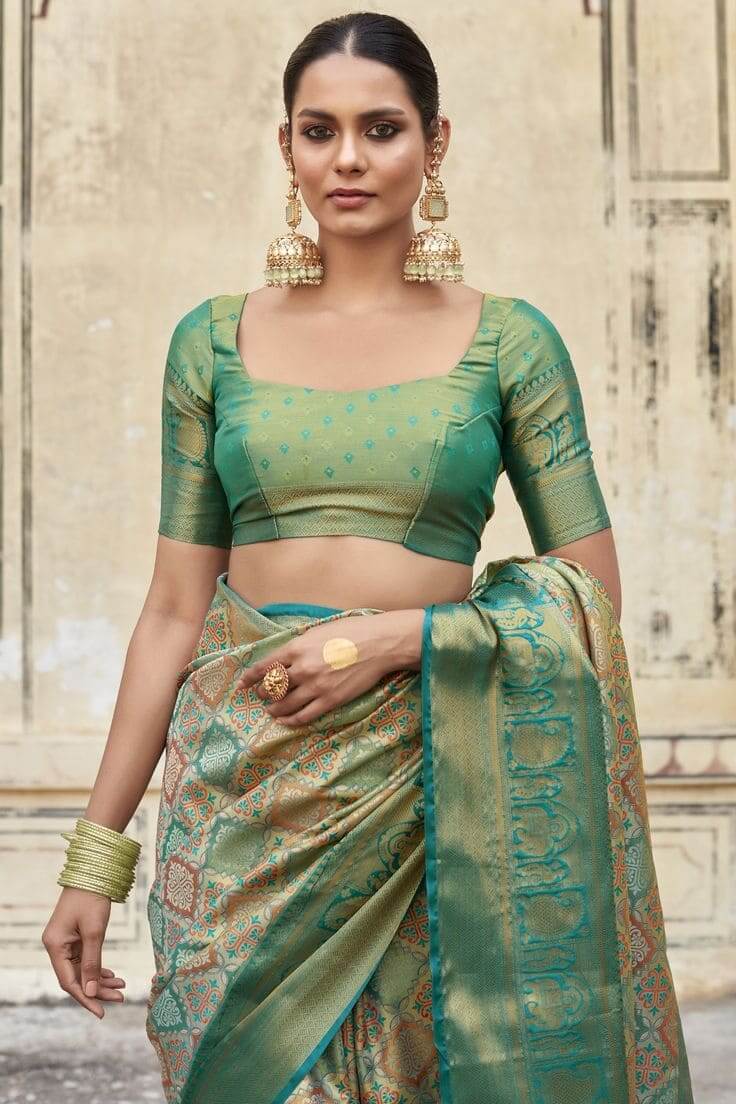 Teal brocade blouse