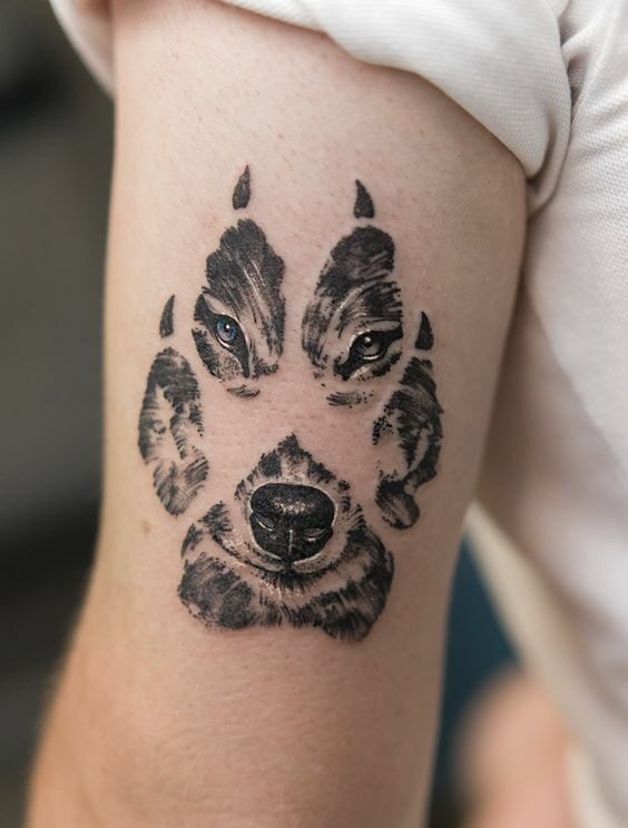 Wolf tricep tattoo