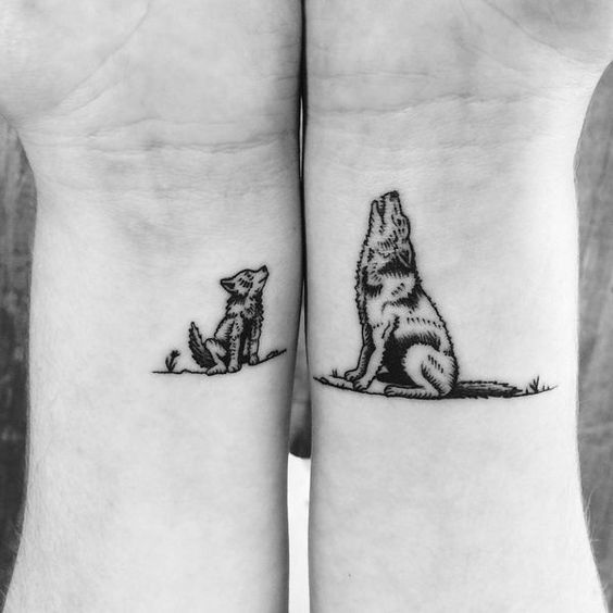 Wolf wrist tattoo