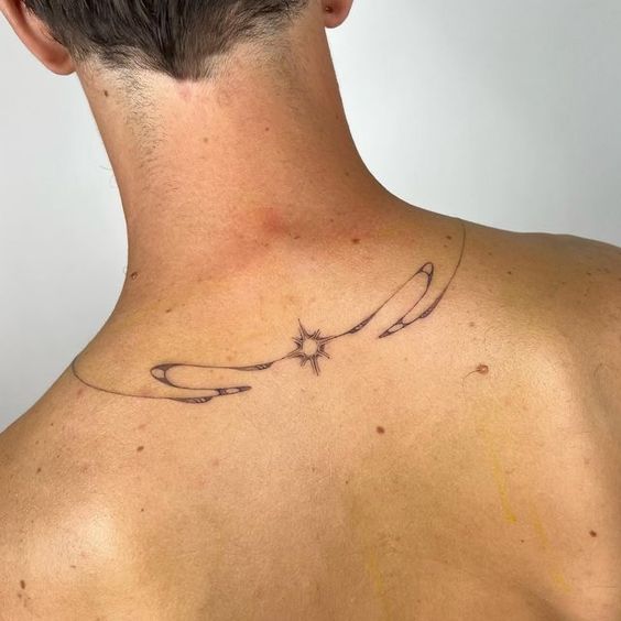 Abstract minimalist back tattoo