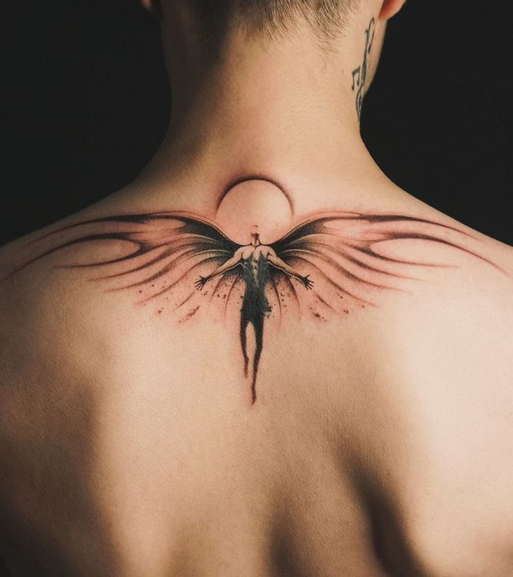 Angel wings back tattoo idea
