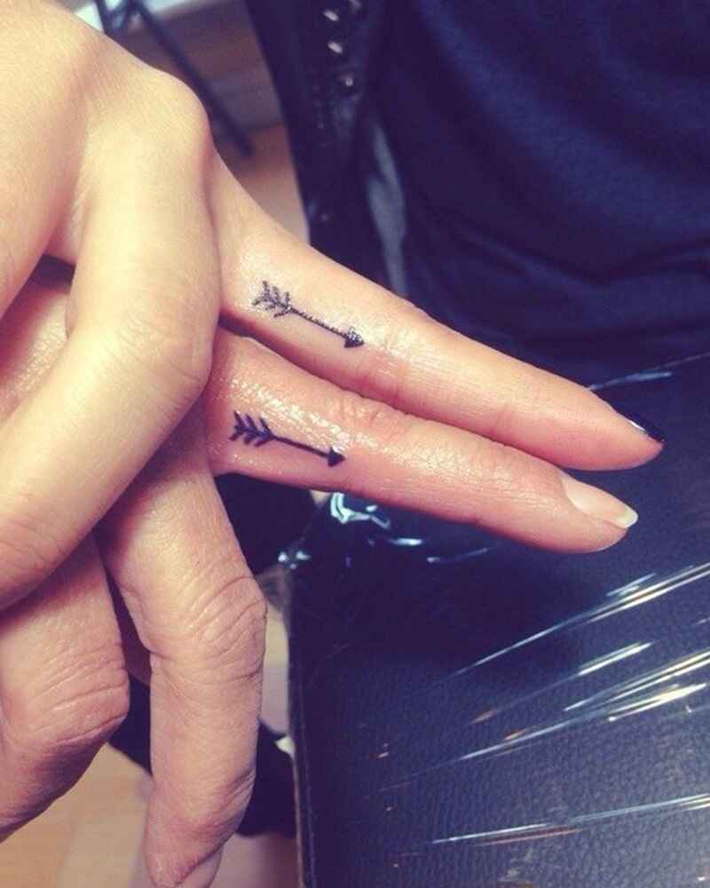 Arrow-finger-tattoo-for-girls