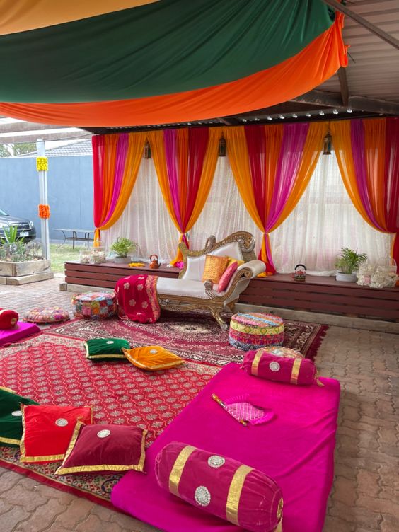Cozy sitting decoration for mehndi function at home