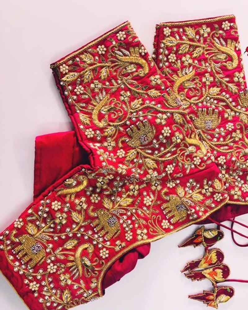 Embroidered-animal-and-floral-motifs-marriage-bridal-maggam-work-blouse-designs
