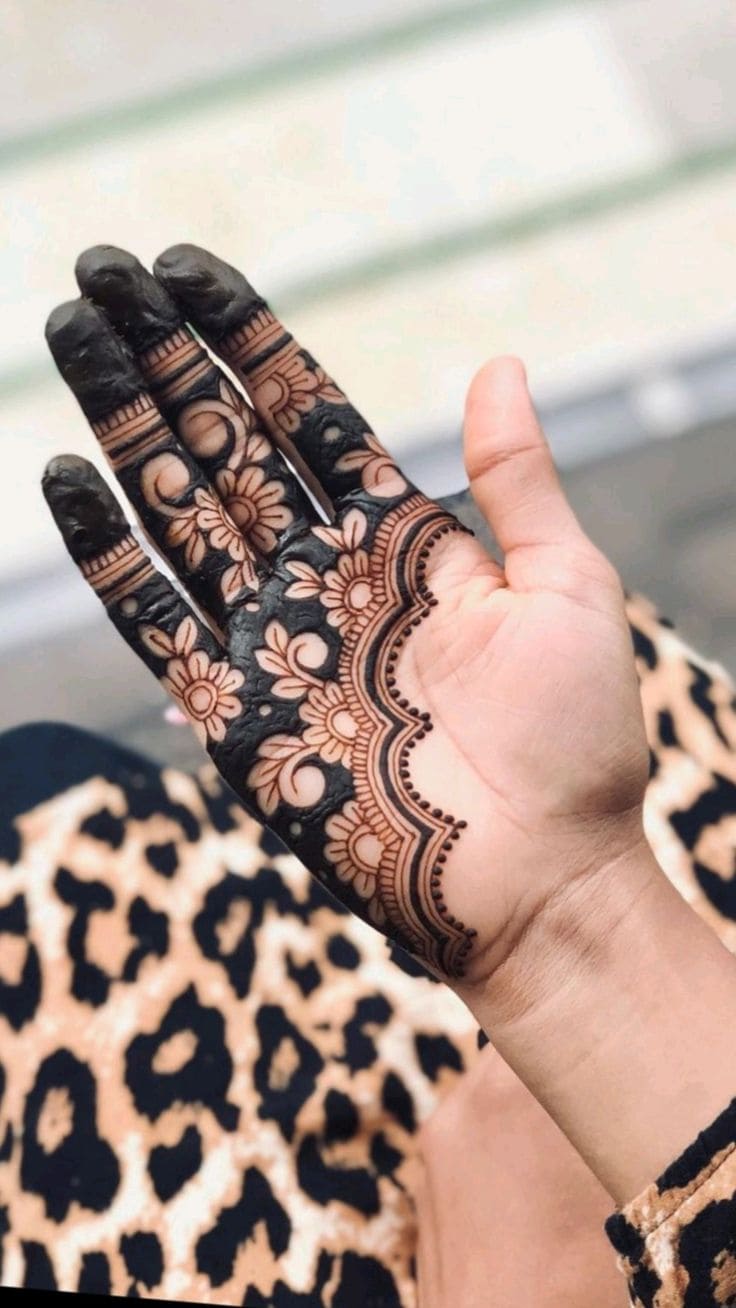 Half hand negative floral mehndi