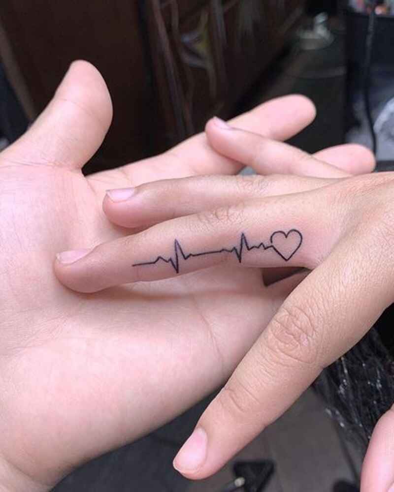Heartbeat-finger-tattoo-for-girls
