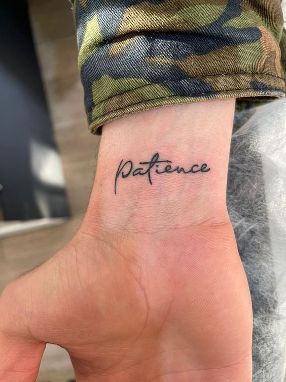 Lettering tattoo for wrist