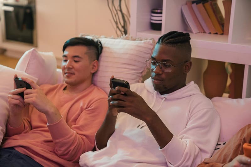 Man playing games on mobile