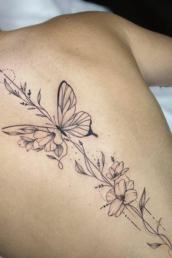 Minimalistic butterfly tattoo