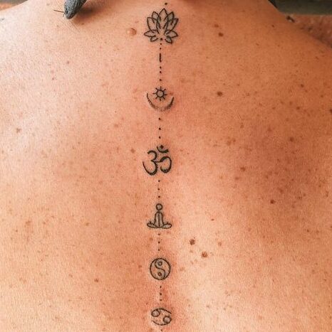 Om back tattoo