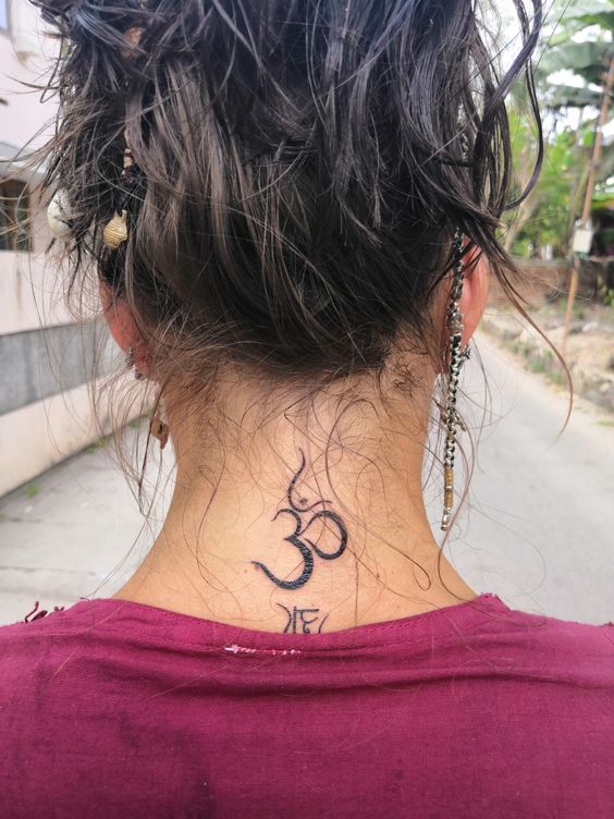 Om neck tattoo