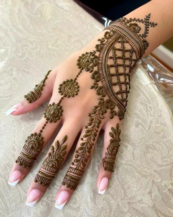 Ornamental back hand mehndi design