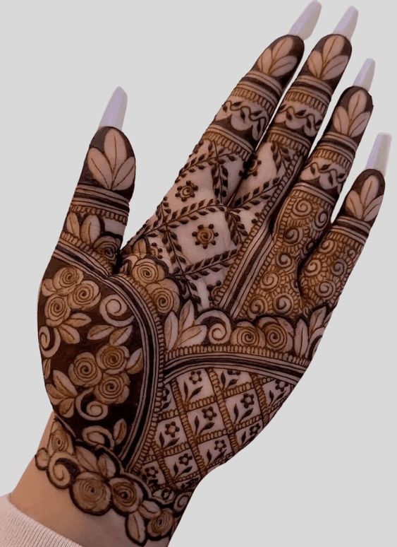 Palm henna design with overlapping motifs