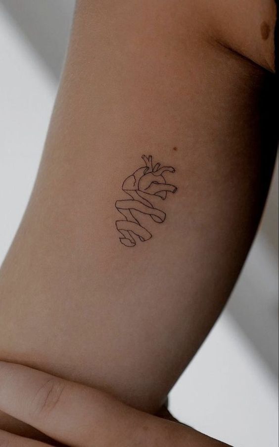 Quirky arm tattoo
