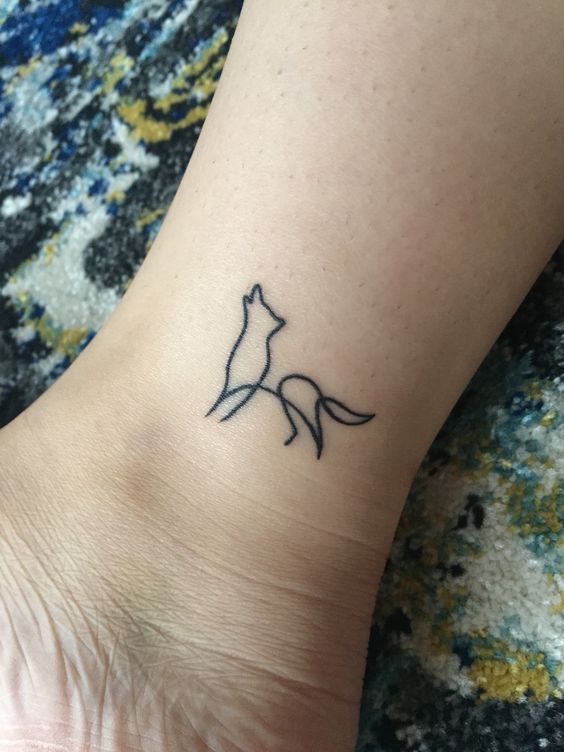 Single line wolf tattoo