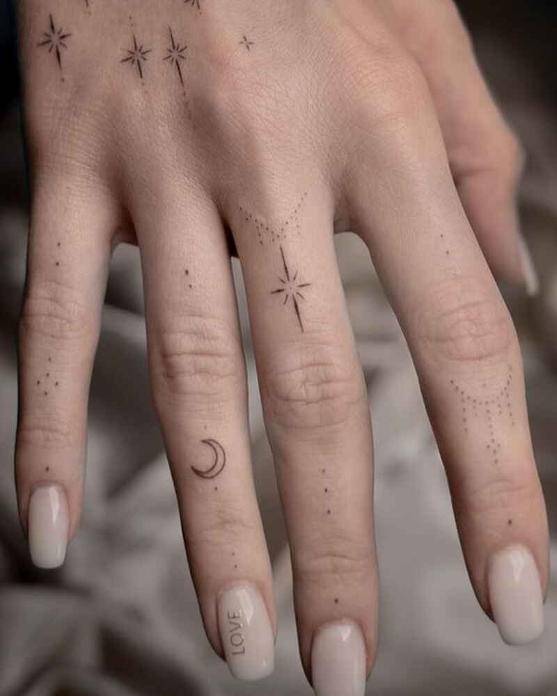 Small-stars-cute-finger-tattoos