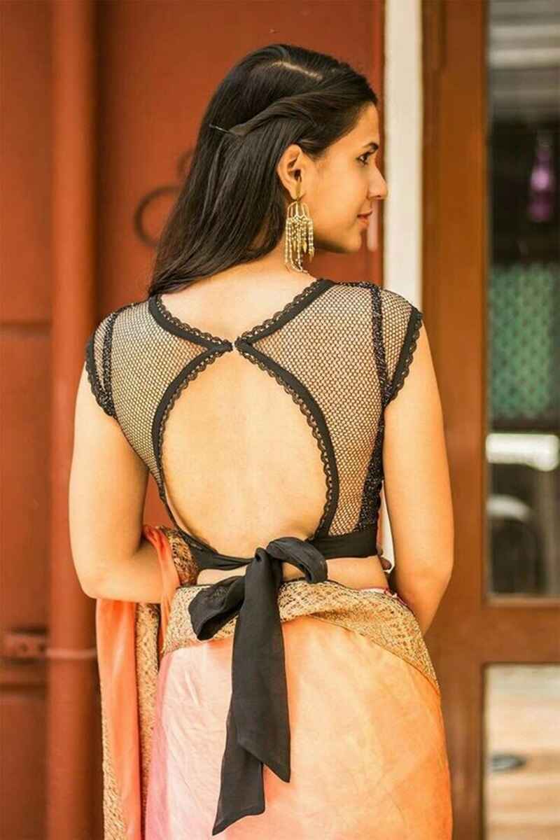 Tie-up-bow-with-round-cut-out-sexy-blouse-design