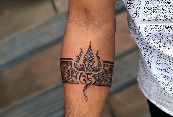 Trishul arm band tattoo