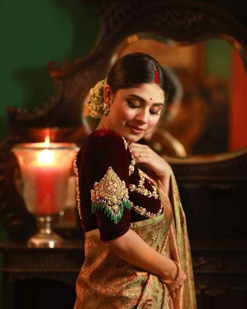 Velvet-blouse-with-kundan-embellished-marriage-bridal-maggam-work-blouse-designs