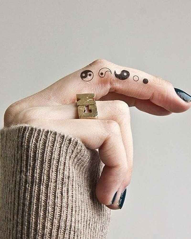 Yin-and-yang-meaningful-finger-tattoos-for-girls