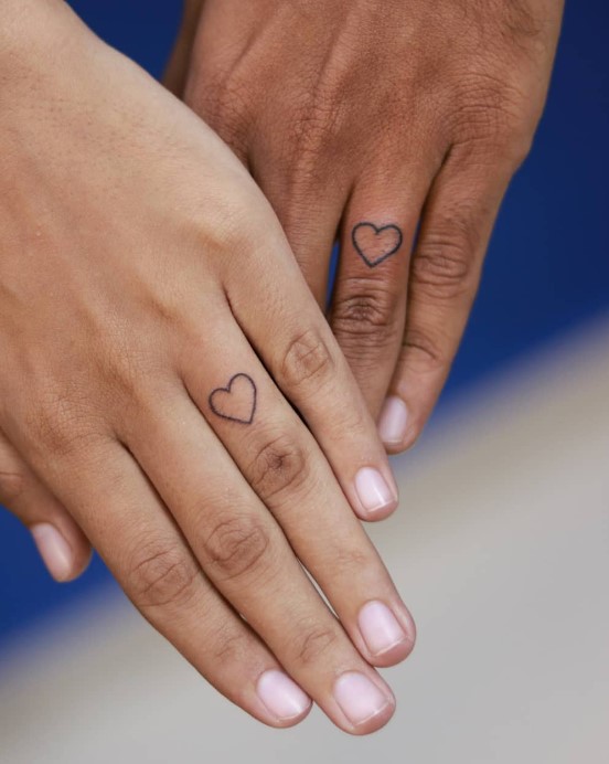couple finger tattoos