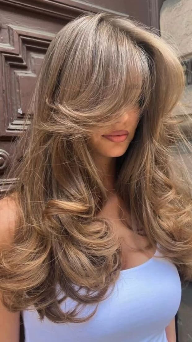 step cut with fringes for long hair 