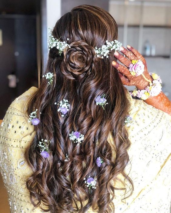 Open hair floral knot hairstyle