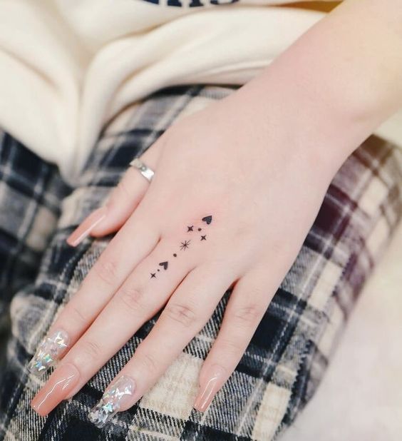 cute finger tattoos