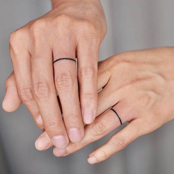 simple finger tattoo