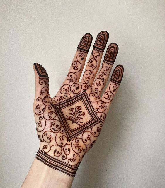 Line henna design with central motif
