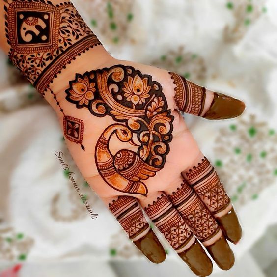 peacock mehndi design with central motif