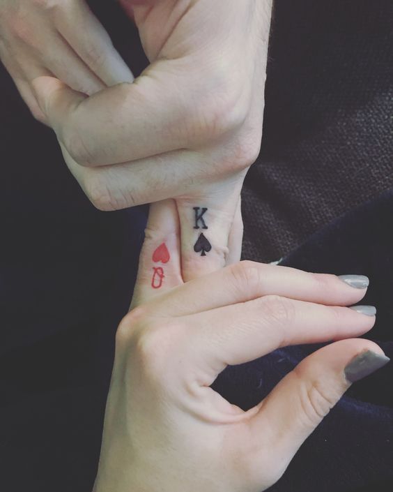 Symbol finger tattoo